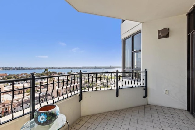 balcony featuring a water view