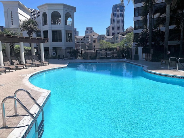 view of swimming pool featuring a patio