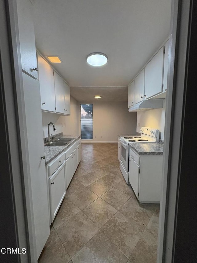 kitchen with sink, white electric stove, and white cabinetry