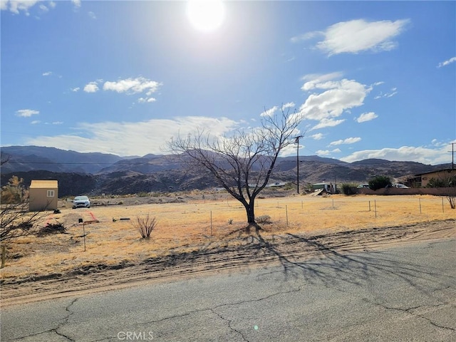 view of mountain feature featuring a rural view