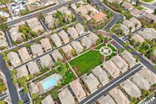 birds eye view of property with a residential view