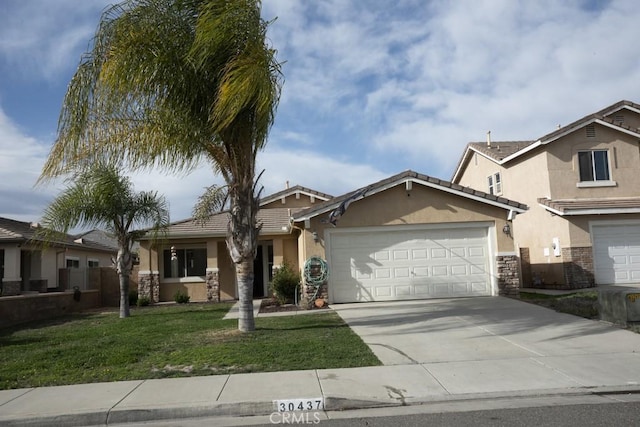 view of front facade with a front lawn and a garage