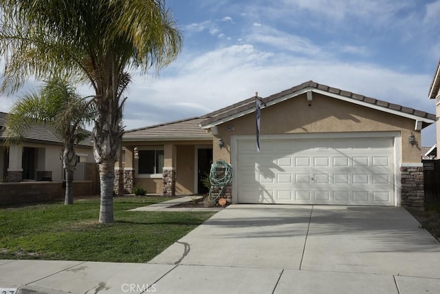 single story home featuring a front yard and a garage