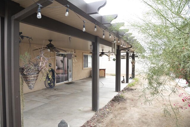 view of patio / terrace with ceiling fan