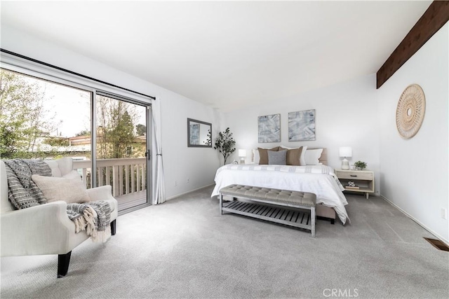 bedroom with vaulted ceiling with beams, carpet, and access to outside