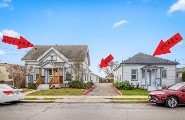 bungalow-style house with a front yard