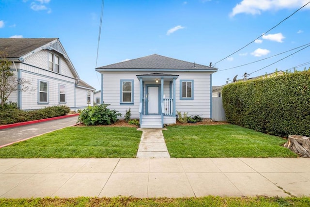 bungalow with a front lawn