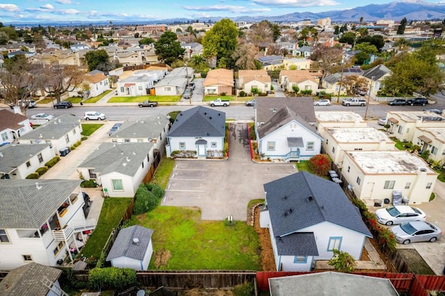 birds eye view of property featuring a mountain view