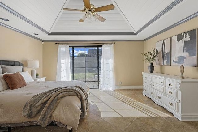 bedroom with ornamental molding, ceiling fan, a tray ceiling, and access to exterior