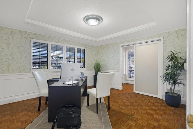 dining room with ornamental molding and dark parquet floors