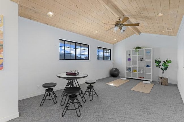 interior space with carpet floors, ceiling fan, vaulted ceiling with beams, and wood ceiling