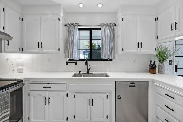 kitchen featuring sink, white cabinetry, dishwasher, backsplash, and electric stove