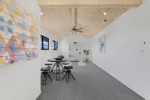 dining room with ceiling fan, wood ceiling, vaulted ceiling, and carpet