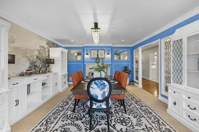 dining space with ornamental molding