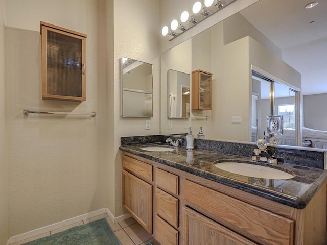 bathroom featuring vanity and tile patterned floors