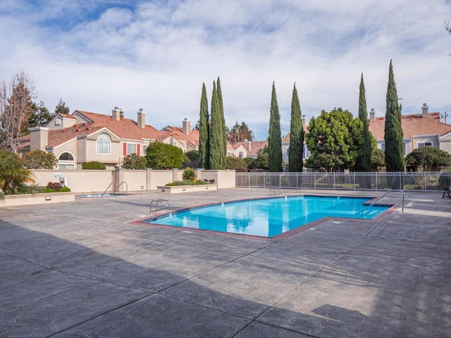 view of pool with a patio