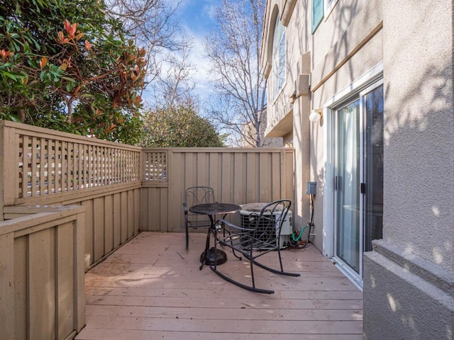 wooden terrace featuring central AC