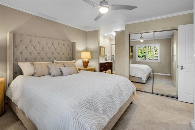 bedroom with ceiling fan, crown molding, a closet, and light carpet