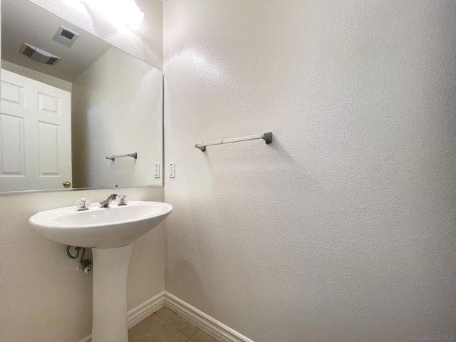 bathroom featuring sink and tile patterned floors