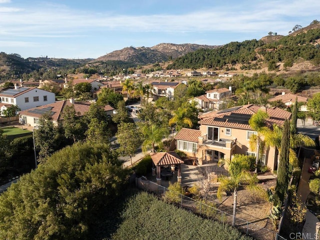 drone / aerial view featuring a mountain view