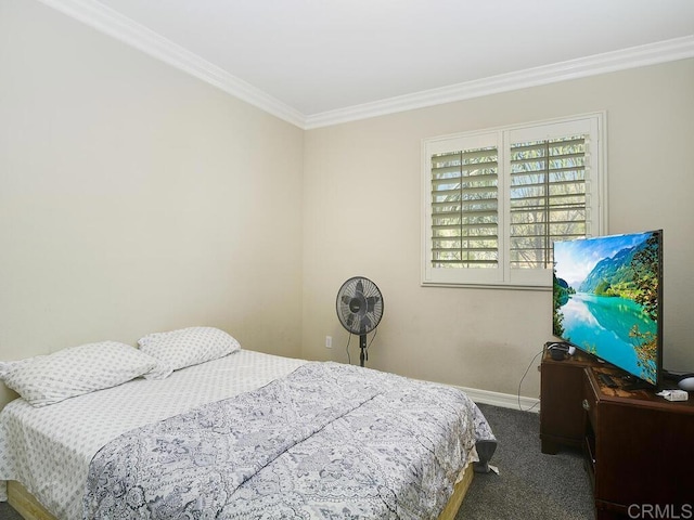 carpeted bedroom featuring crown molding