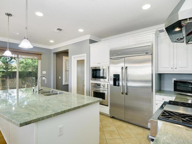 kitchen with white cabinetry, ventilation hood, hanging light fixtures, built in appliances, and sink