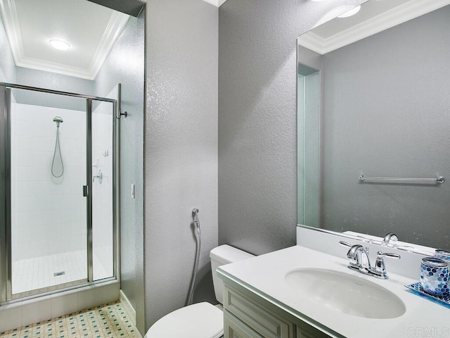 bathroom with toilet, vanity, ornamental molding, and an enclosed shower