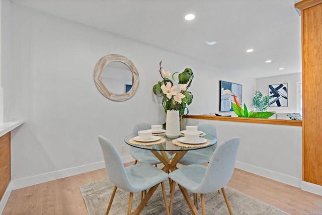 dining room featuring light hardwood / wood-style floors