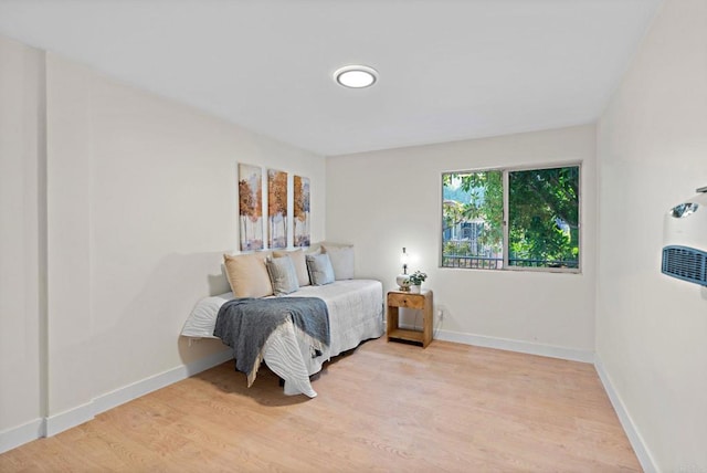 bedroom featuring light hardwood / wood-style floors