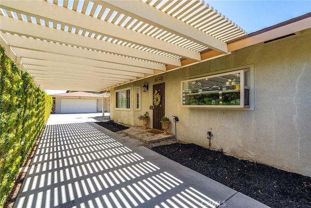 view of patio featuring a garage