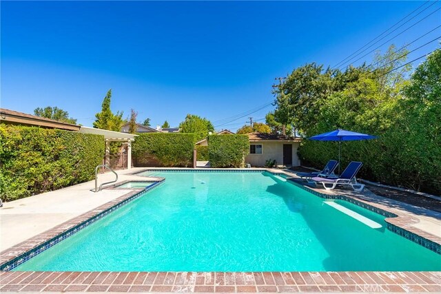 view of pool featuring a patio and a fenced in pool
