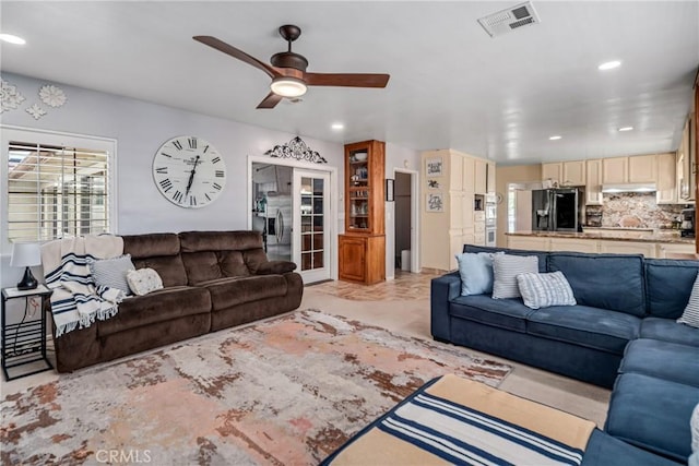 living room with recessed lighting, ceiling fan, and visible vents