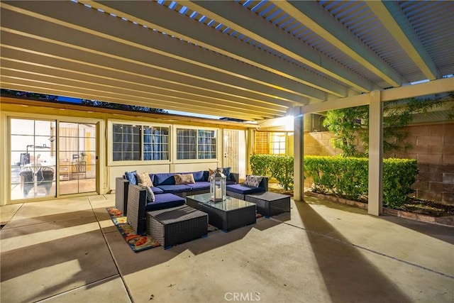 view of patio / terrace with fence and an outdoor hangout area