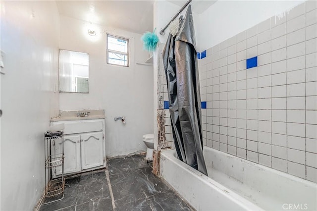 full bathroom featuring toilet, vanity, and shower / bathtub combination with curtain