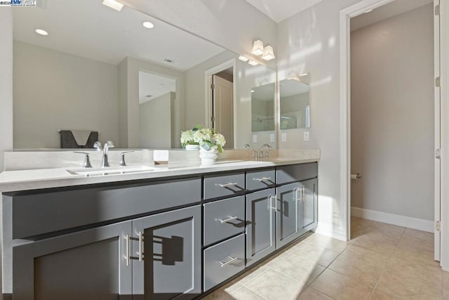 bathroom featuring tile patterned floors and vanity