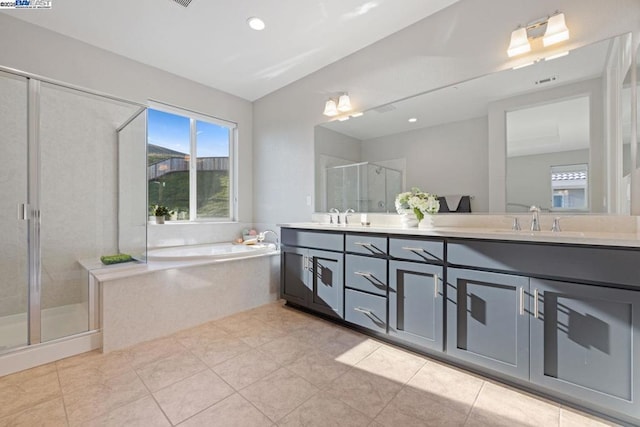 bathroom featuring vanity, separate shower and tub, and tile patterned flooring