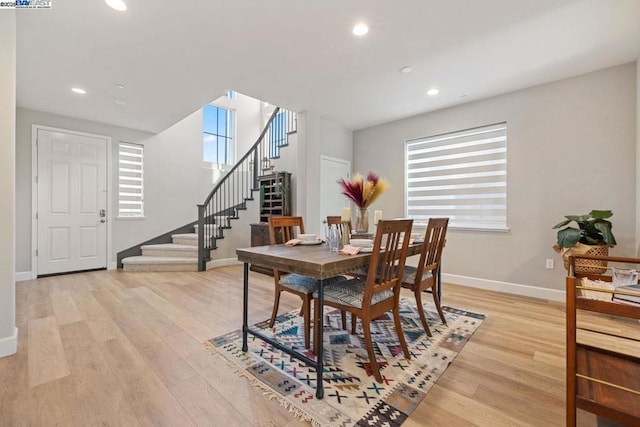 dining area with light hardwood / wood-style flooring