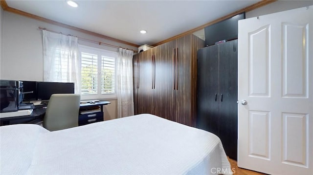 bedroom with crown molding