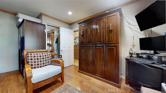 interior space featuring crown molding and light hardwood / wood-style flooring