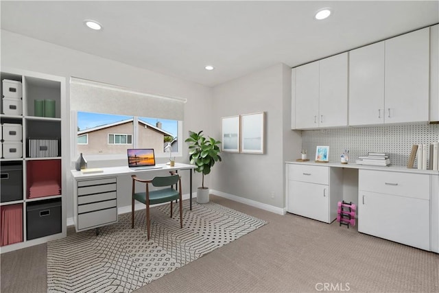 home office featuring baseboards, recessed lighting, and light colored carpet