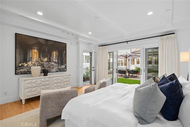 bedroom featuring access to exterior, wood-type flooring, and beamed ceiling