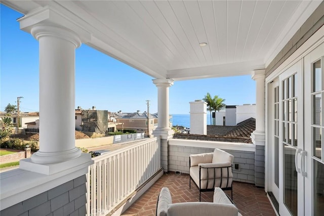 balcony featuring french doors