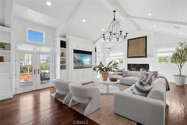 living room featuring dark wood-type flooring, built in features, french doors, high vaulted ceiling, and beam ceiling