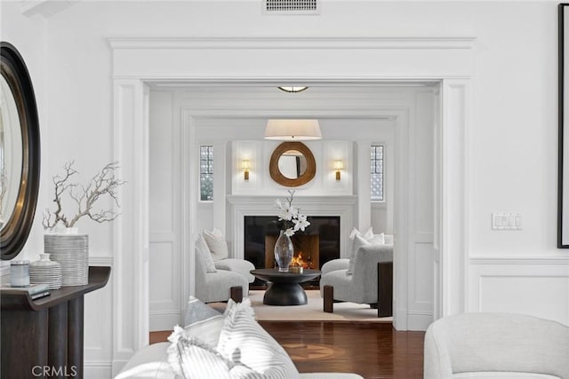 sitting room featuring hardwood / wood-style flooring