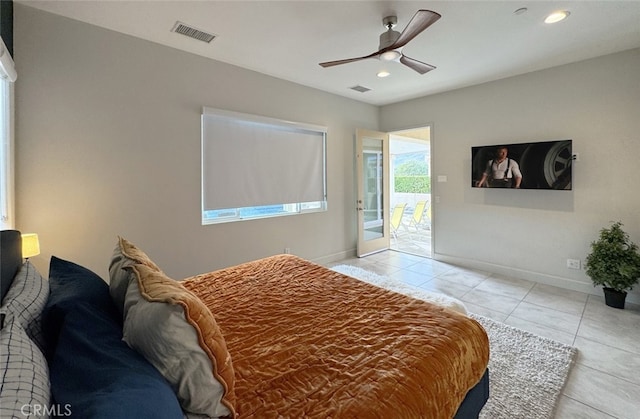 bedroom with ceiling fan, access to exterior, and light tile patterned floors