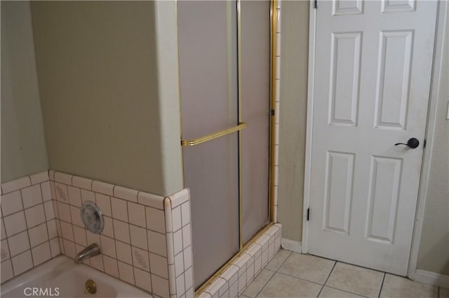 bathroom featuring independent shower and bath and tile patterned flooring