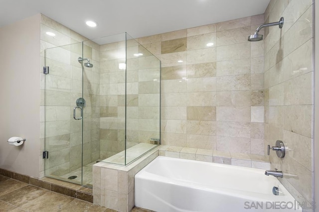 bathroom with independent shower and bath