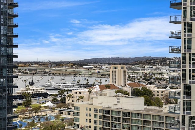 property's view of city with a water view