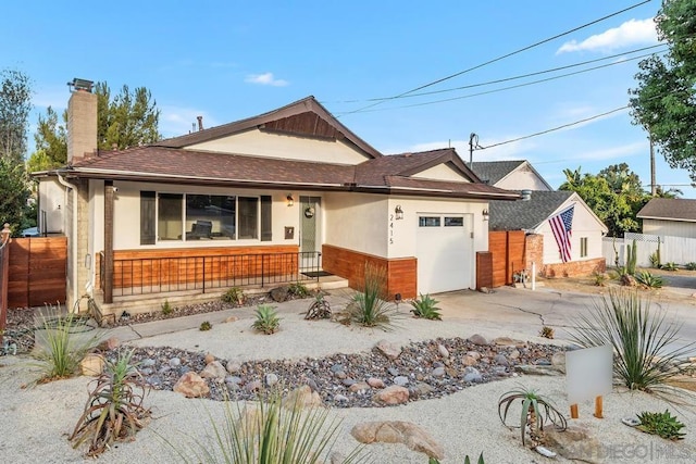 view of front of property featuring a garage