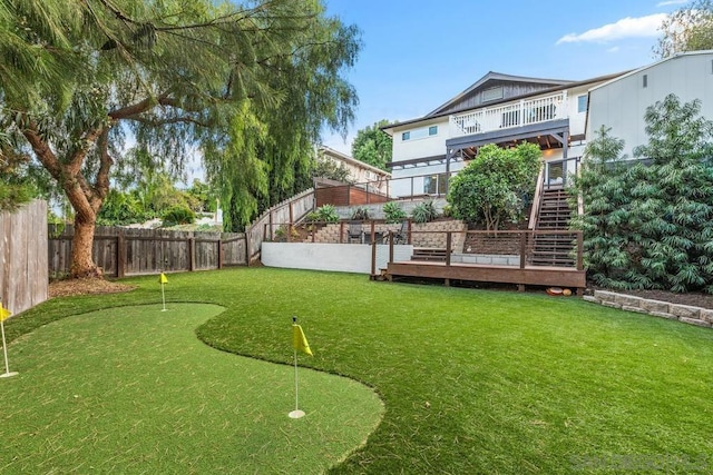 view of yard featuring a wooden deck